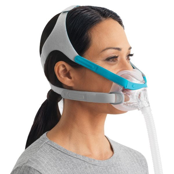 woman wearing CPAP mask